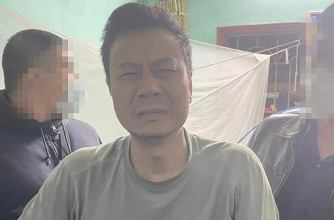 Nguyễn Thanh Tùng lúc bị bắt. Ảnh: Công an cung cấp