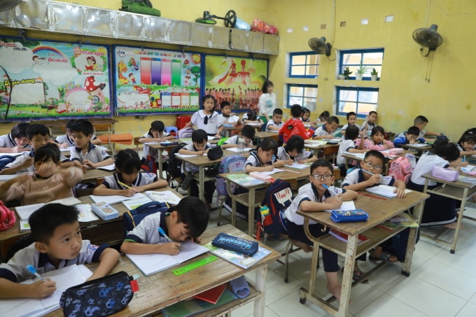 Học sinh lớp triểu học ở một trường TP Huế. Ảnh: Võ Thạnh