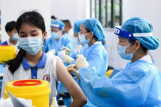 Trung Quốc tiêm vắc xin Covid-19 cho 91% học sinh 12 - 17 tuổi