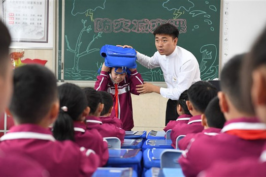 Trung Quốc: Cha mẹ đăng ký “học thêm” về giáo dục con cái