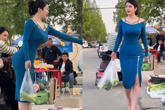 Cô gái mặc váy ôm sát cơ thể đi chợ mua rau gây chú ý