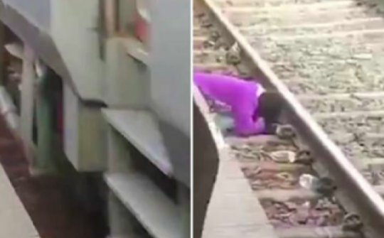 Bà mẹ Ấn Độ lấy thân che cho 2 con ngã xuống đường ray