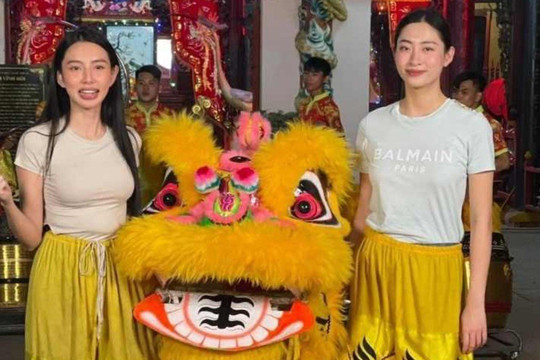 Thì ra 'mỹ nhân múa lân' gây sốt mạng xã hội lại chính là 2 'nàng hậu' Việt đình đám