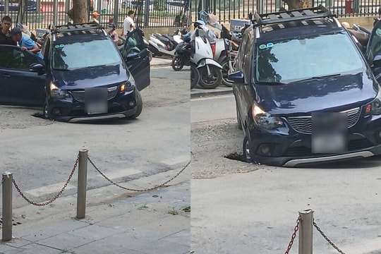 Ô tô sụt hố trước cổng Bệnh viện K Hà Nội